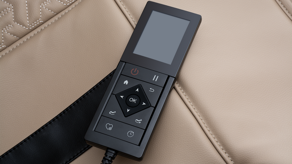 Massage chair remote with a display and directional pad on a beige leather seat.